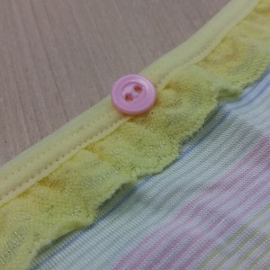 Conjunto microfibra detalhes em Boto